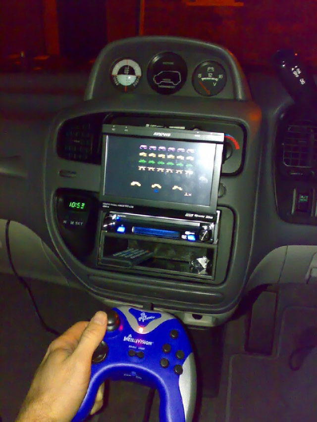 Mitsubishi Delica L400 with Ripspeed DV920i in-dash DVD player and optional altimeter and compass pod.