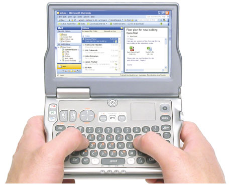 The concept has been further revised and given the name FlipStart - the LID (LCD Interactive Display) on the top of the device is now present, with membrane-type media control keys and media display function provided. More development of the keyboard. Specification at this stage appears to be Transmeta Crusoe at 1GHz, 256MB RAM, 8GB VRAM, 30GB HD, WiFi and USB.