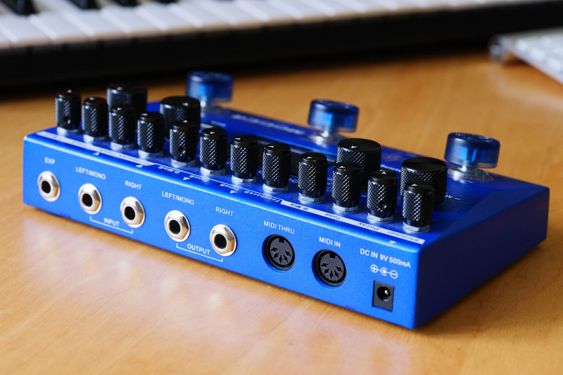 The Mooer Ocean Machine (Mk1) ports - expression pedal, left/mono and right inputs on unbalanced 1/4-inch jacks, left/mono and right outputs on unbalanced jacks, and five-pin DIN MIDI in and THRU. The power supply is a standard 9V centre-negative type demanding 500 milliamps, and there's no battery power provision but if can be used with a suitable battery pack